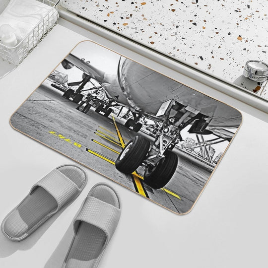 Copy of Boeing 747 Nose Wheel Parked on Yellow Line  Slip-Resistant Bath Mat