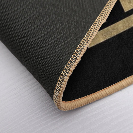 LGRFLD – Lagerfeld  Gold on Black  Slip-Resistant Bath Mat