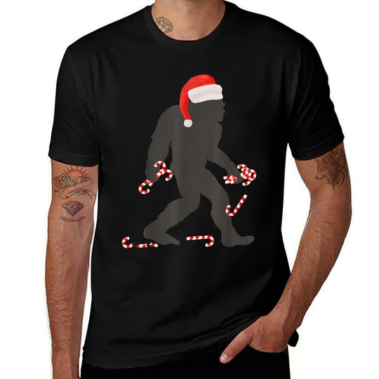 Funny Christmas Bigfoot with Santa Hat Carrying Candy Canes  Odor-resistant T-Shirt